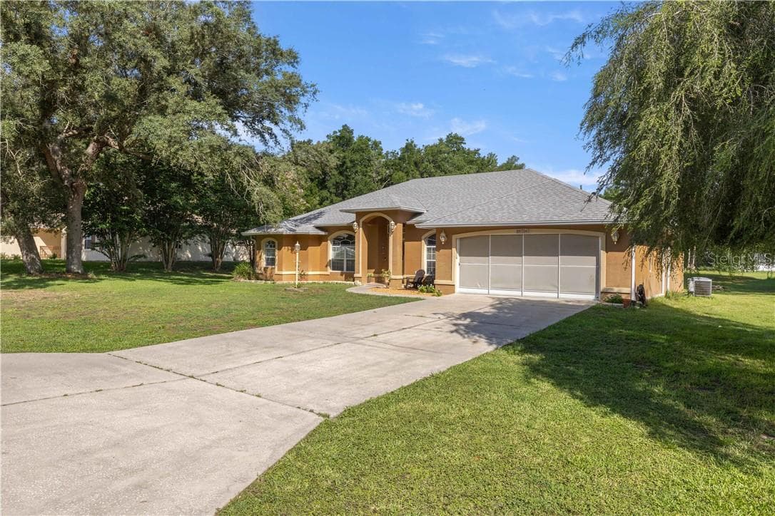 Side View of Home - 10716 SW 53rd CIR, OCALA FL 34476, Ocala