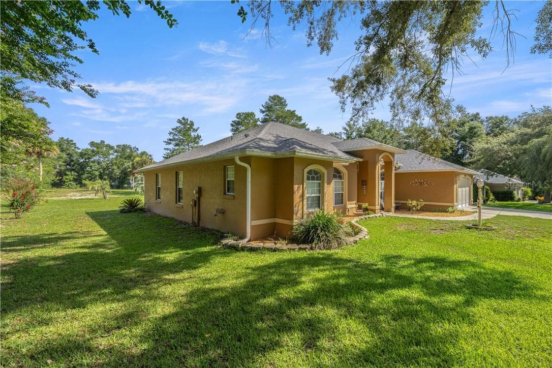 Side View of Home - 10716 SW 53rd CIR, OCALA FL 34476, Ocala