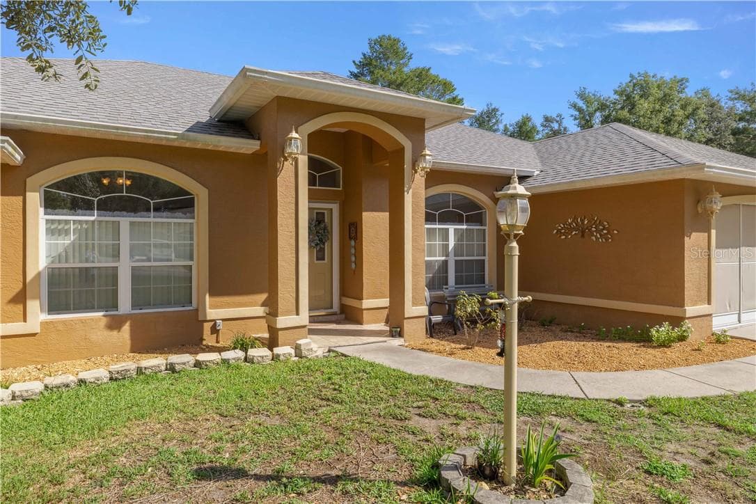 Front View of Home - 10716 SW 53rd CIR, OCALA FL 34476, Ocala