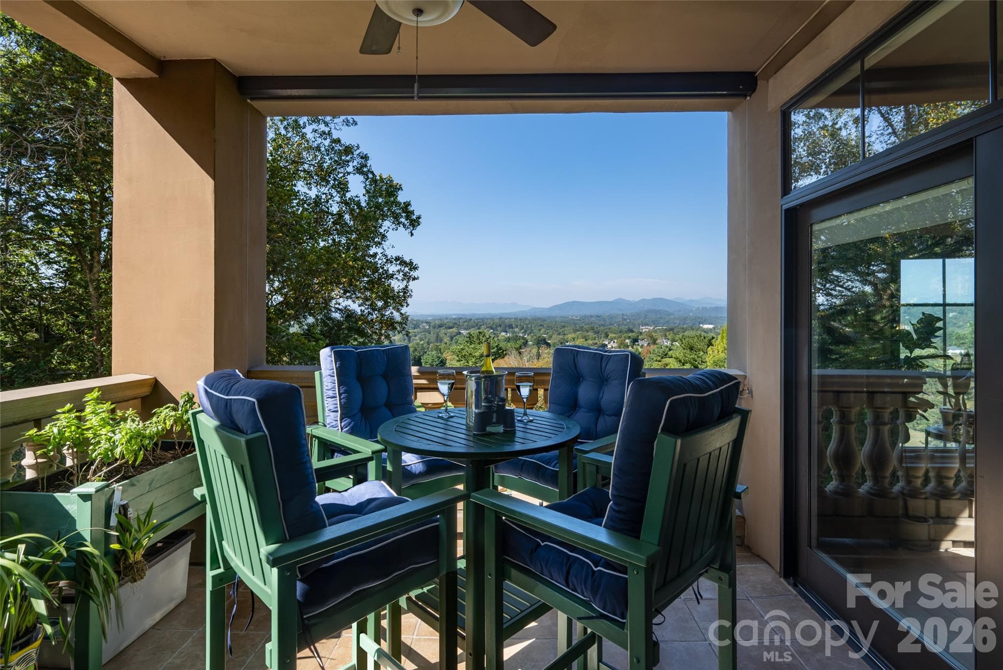 Covered balcony open to two sides for welcoming mountain breezes - 288 Macon Avenue, Asheville