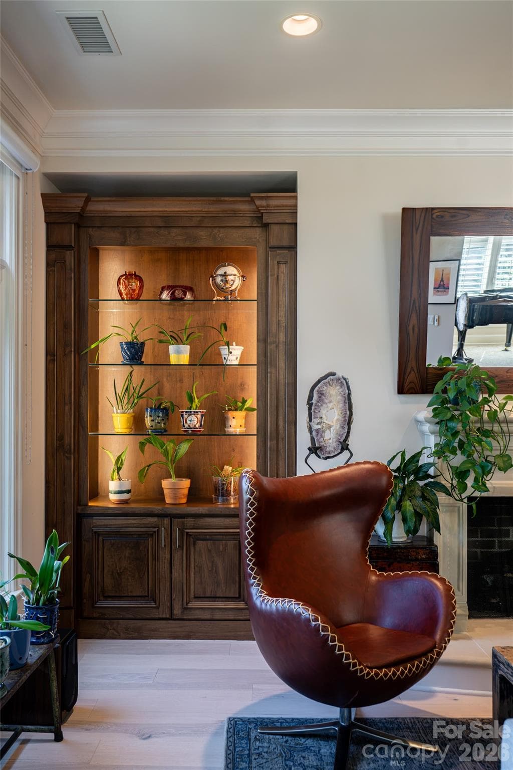 Built in book shelf in living area - 288 Macon Avenue, Asheville