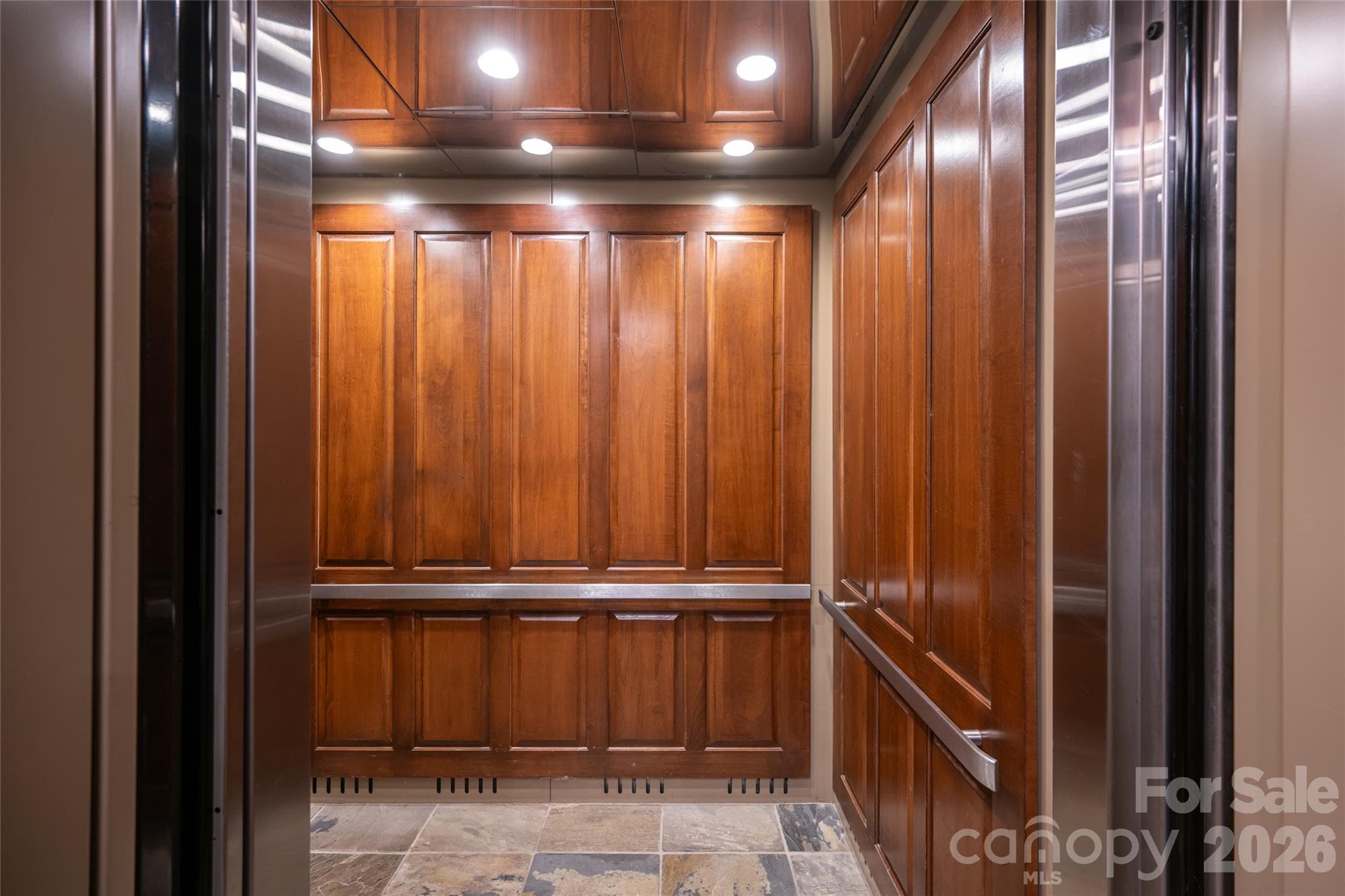 Large elevator services 6 condominiums on the building. - 288 Macon Avenue, Asheville