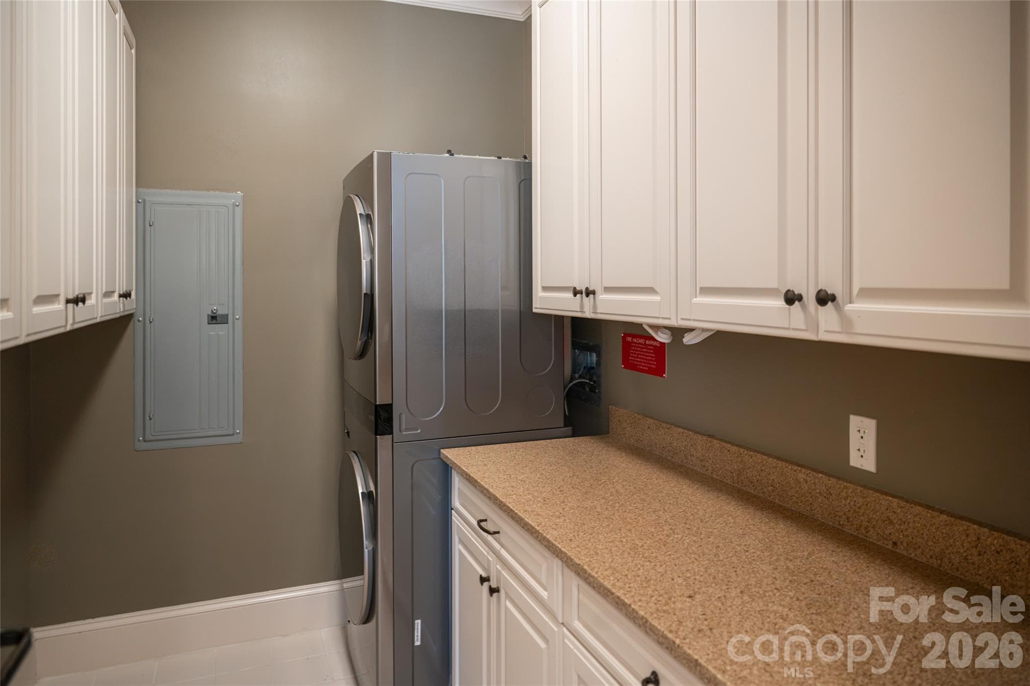 Dedicated laundry room with new stackable washer and dryer - 288 Macon Avenue, Asheville
