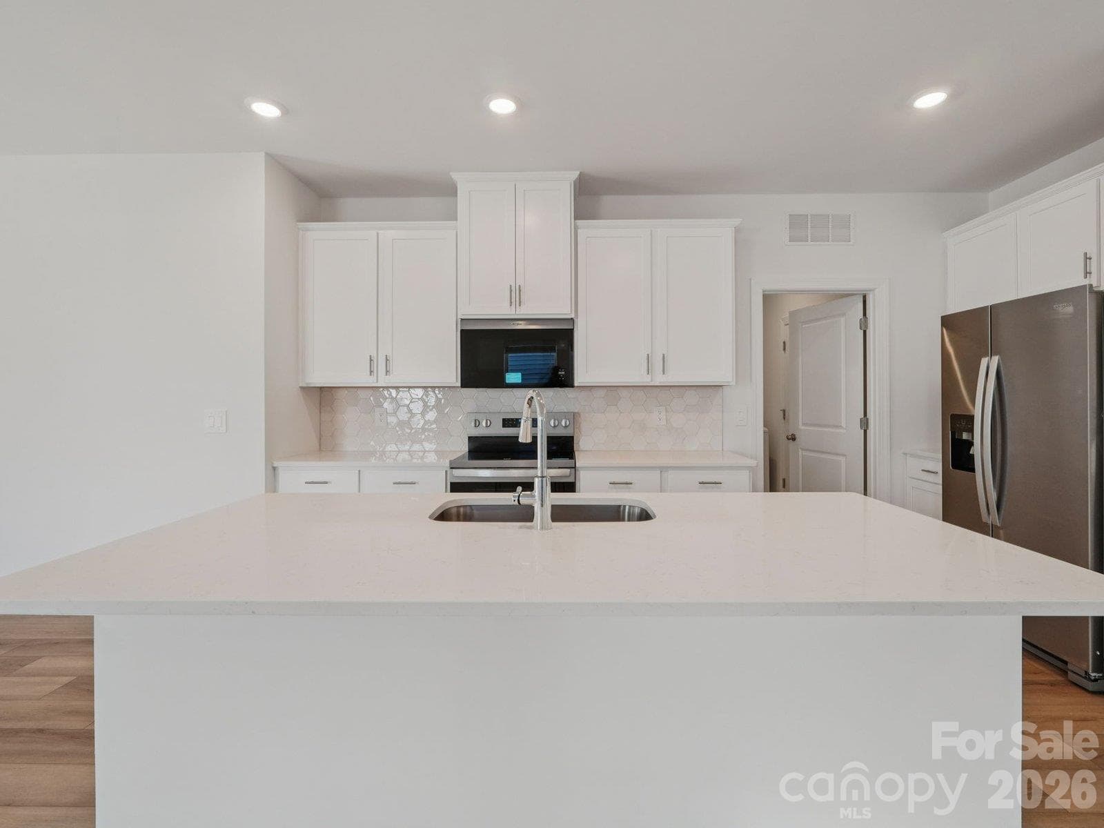 Photo is not of the actual home but is an inspirational photo of builder’s model home and may depict options, furnishings, and/or decorator features that are not included. - 2642 Celestial Drive, Newton