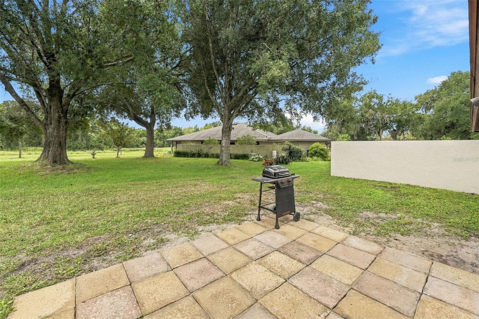 Patio off of Dining - 15 ABBEY CT, HAINES CITY