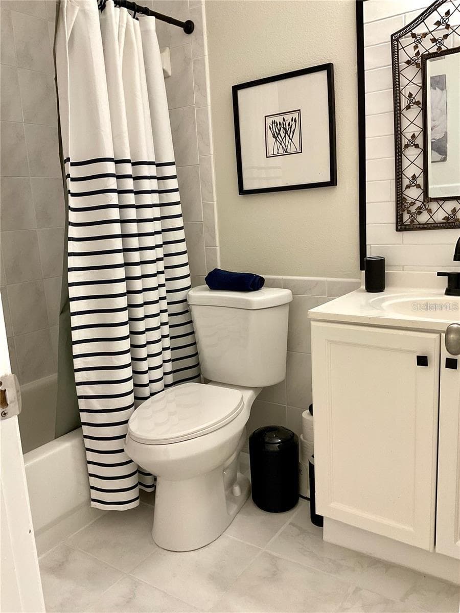 Bathroom entry from hallway - 1020 85TH AVE N #222, ST PETERSBURG
