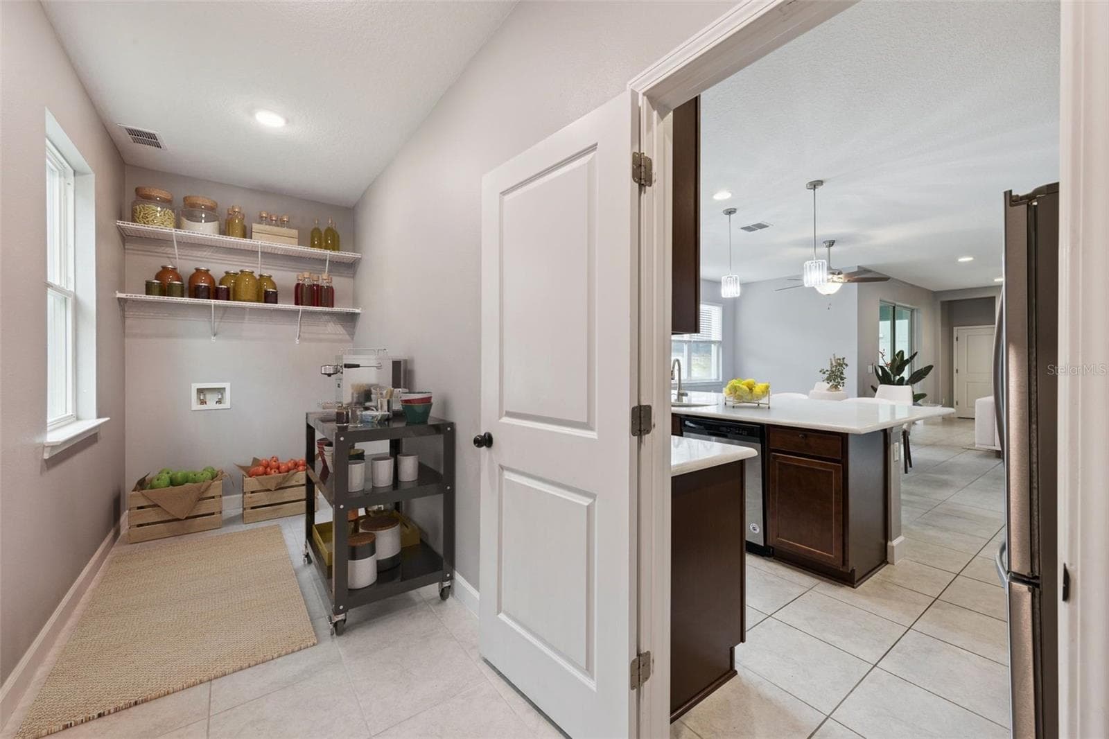 virtual stage extended Kitchen space - 1084 CAVENDER CREEK RD, MINNEOLA