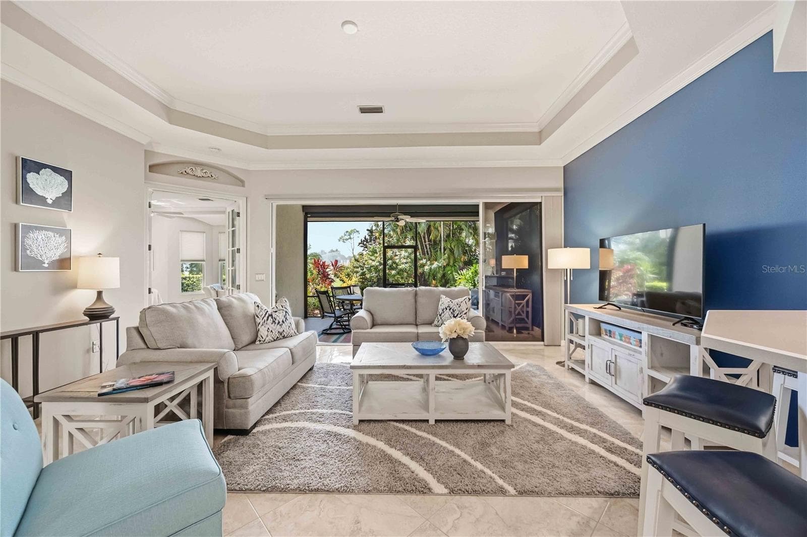 Living Room and Outdoor Screen Room - - 737 MISTY PINE DR, VENICE