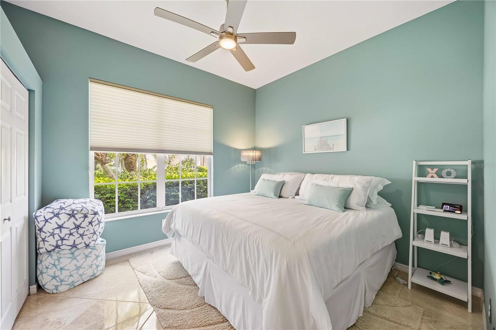 The Guest Suite has total privacy with pocket door closure, king bedroom and private bath. - 737 MISTY PINE DR, VENICE