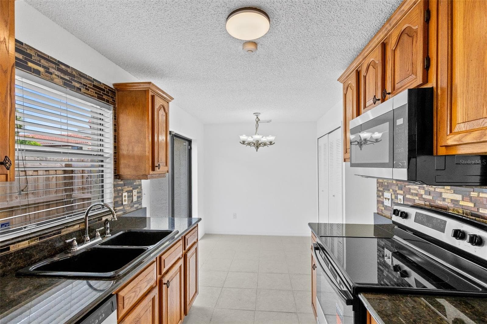 Condominium at 6267 WHISPERING WAY #119, ORLANDO, photo 2 of 28
