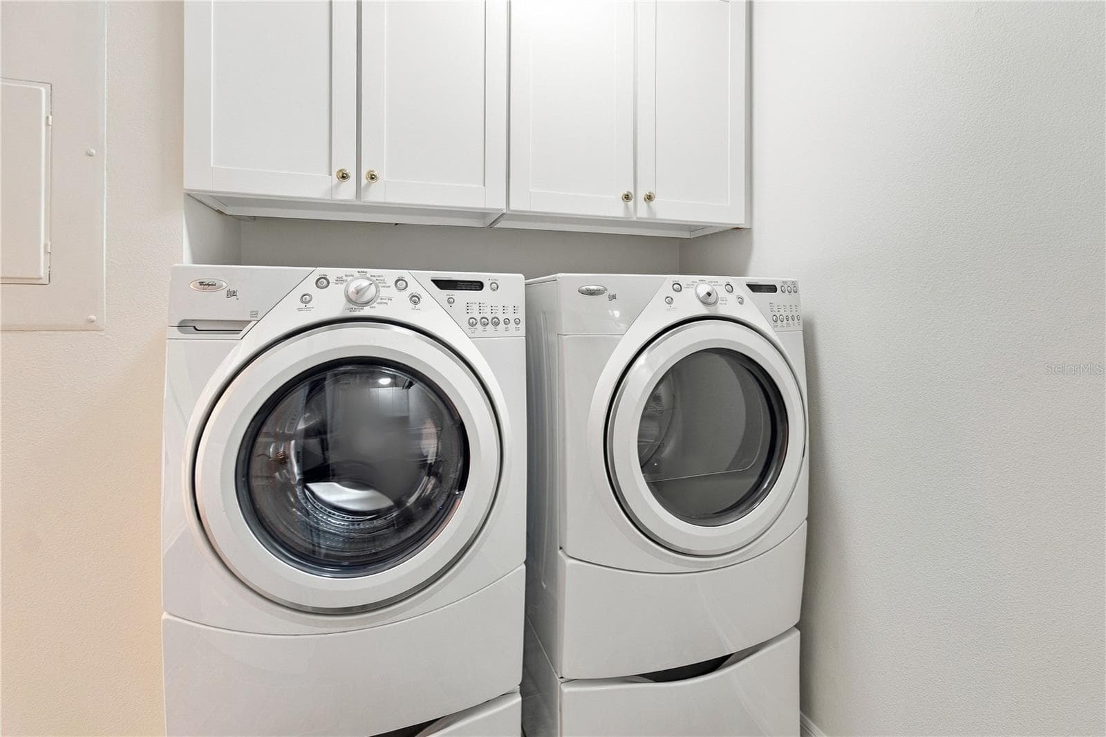 Laundry room with plenty of storage - 4565 BAY CLUB DR #27, BRADENTON
