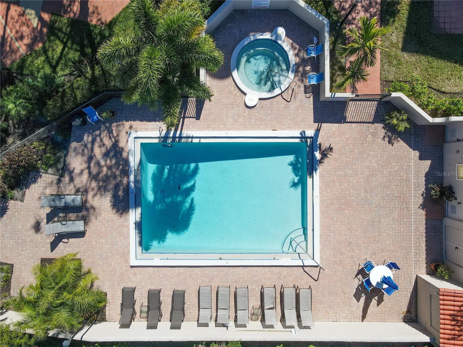 Plenty of room poolside for entertaining or quiet afternoons - 4565 BAY CLUB DR #27, BRADENTON
