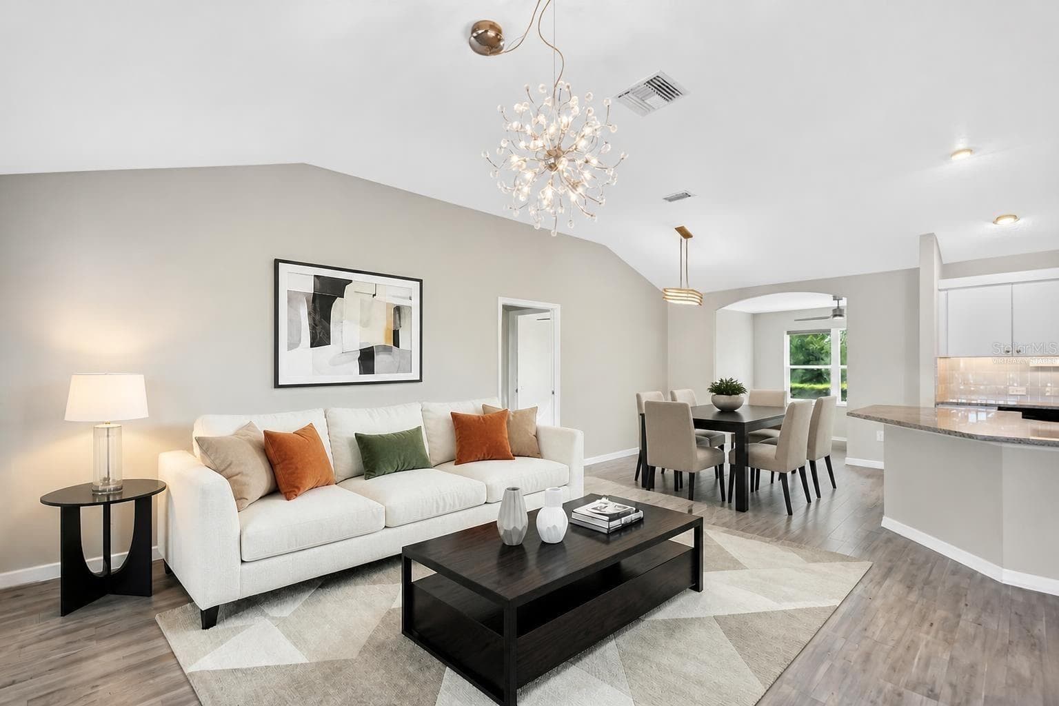 Living, Dining, and Kitchen-Virtually Staged - 3254 ZIPPERER WAY, THE VILLAGES