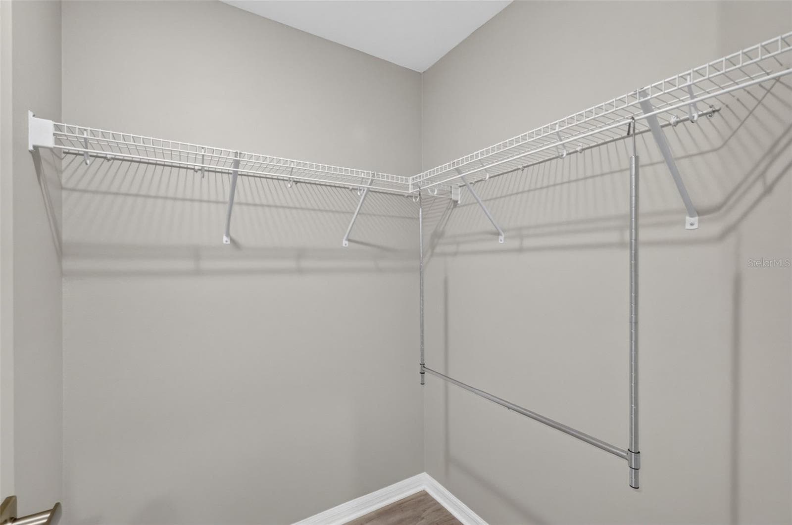 Primary Bedroom First Walk-In Closet - 3254 ZIPPERER WAY, THE VILLAGES