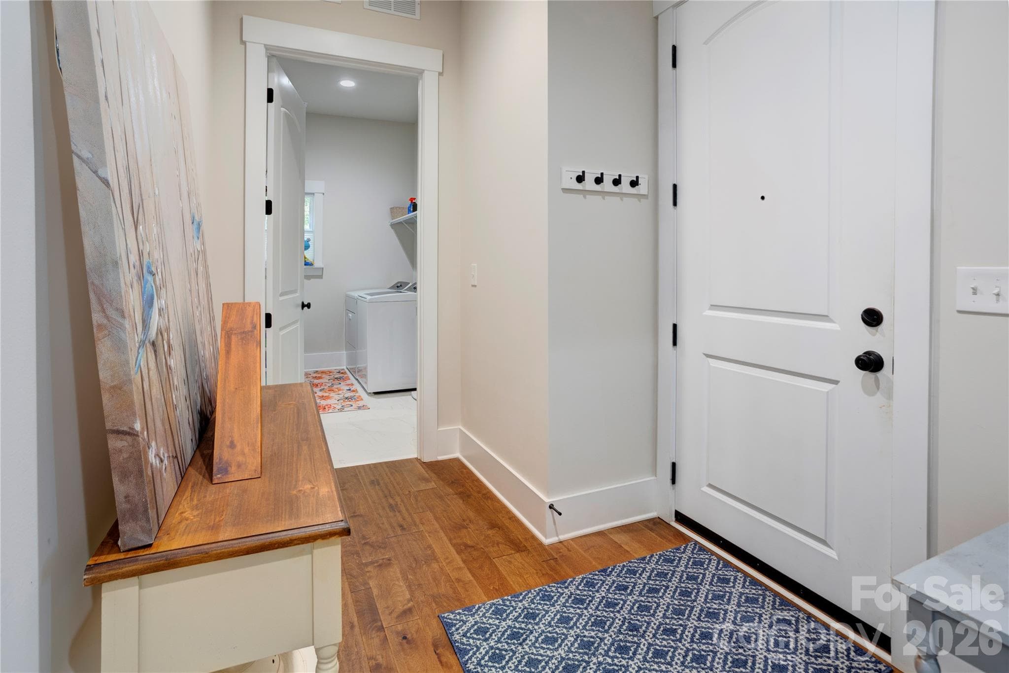 A dedicated drop zone right off the garage keeps keys, bags, and shoes organized and out of sight. - 158 Fulworth Drive NW, Concord