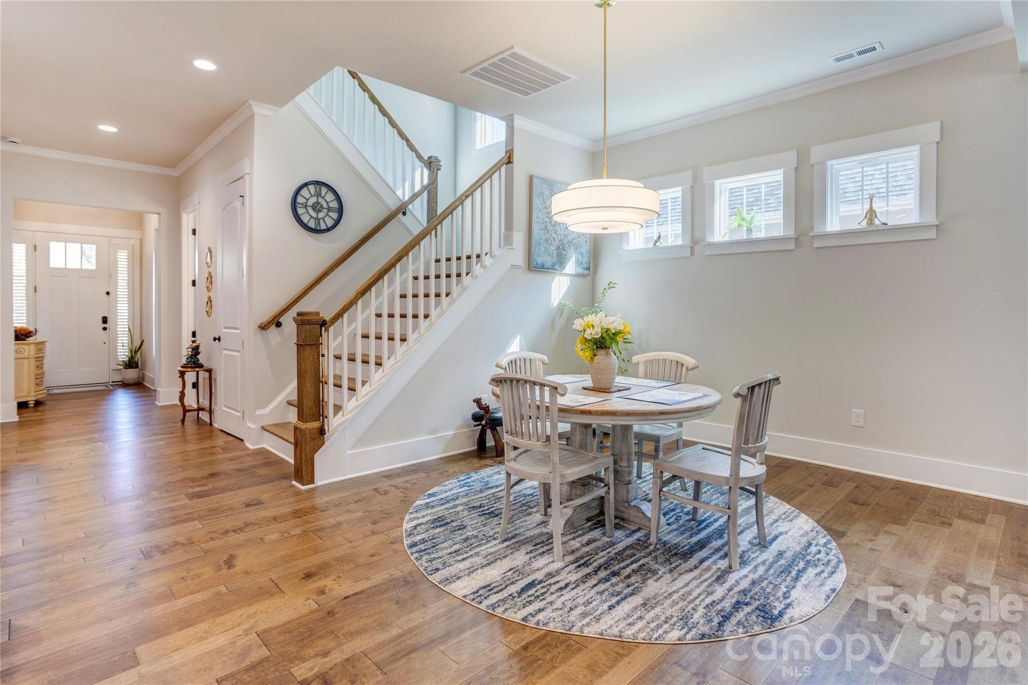 The dining area sits just off the kitchen, with easy access to the upstairs. - 158 Fulworth Drive NW, Concord