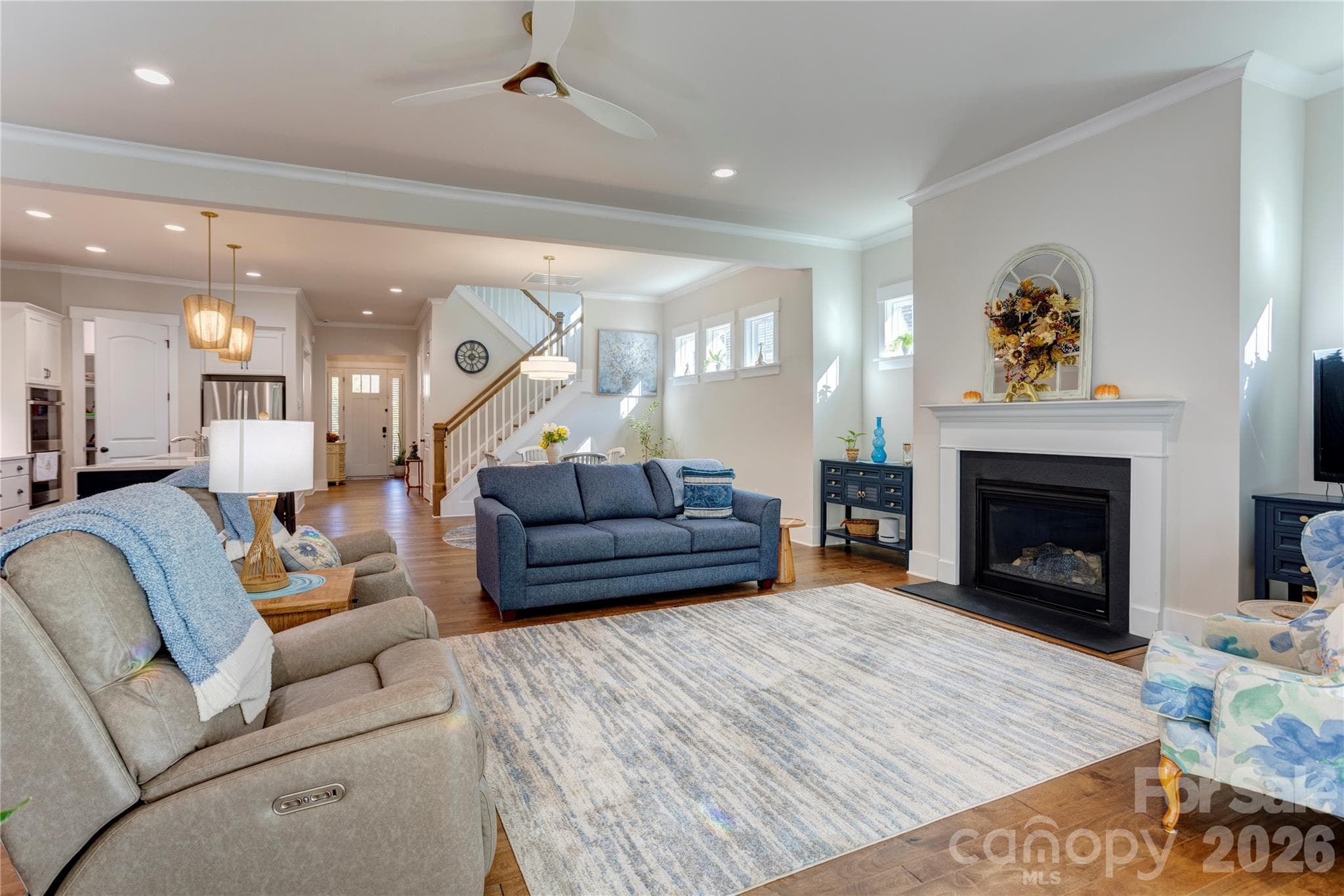 A gas fireplace adds warmth and ambiance at the flip of a switch. - 158 Fulworth Drive NW, Concord