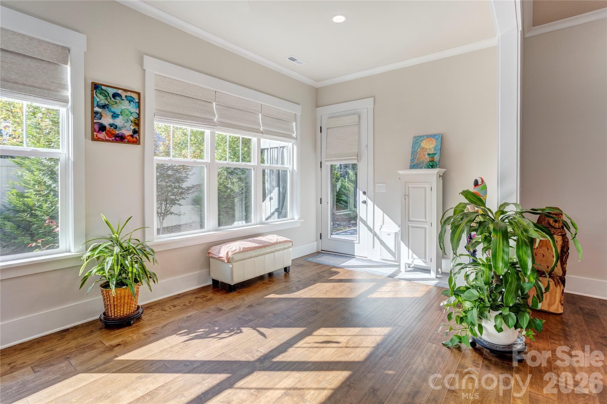 The sunroom leads straight out to the patio, and the built-in doggy door gives four-legged family members easy access too. - 158 Fulworth Drive NW, Concord