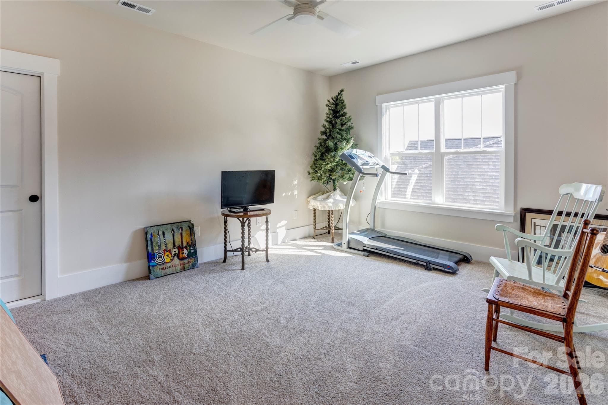 The upstairs loft is ready for a media room, hobby space, or extra lounge area. - 158 Fulworth Drive NW, Concord