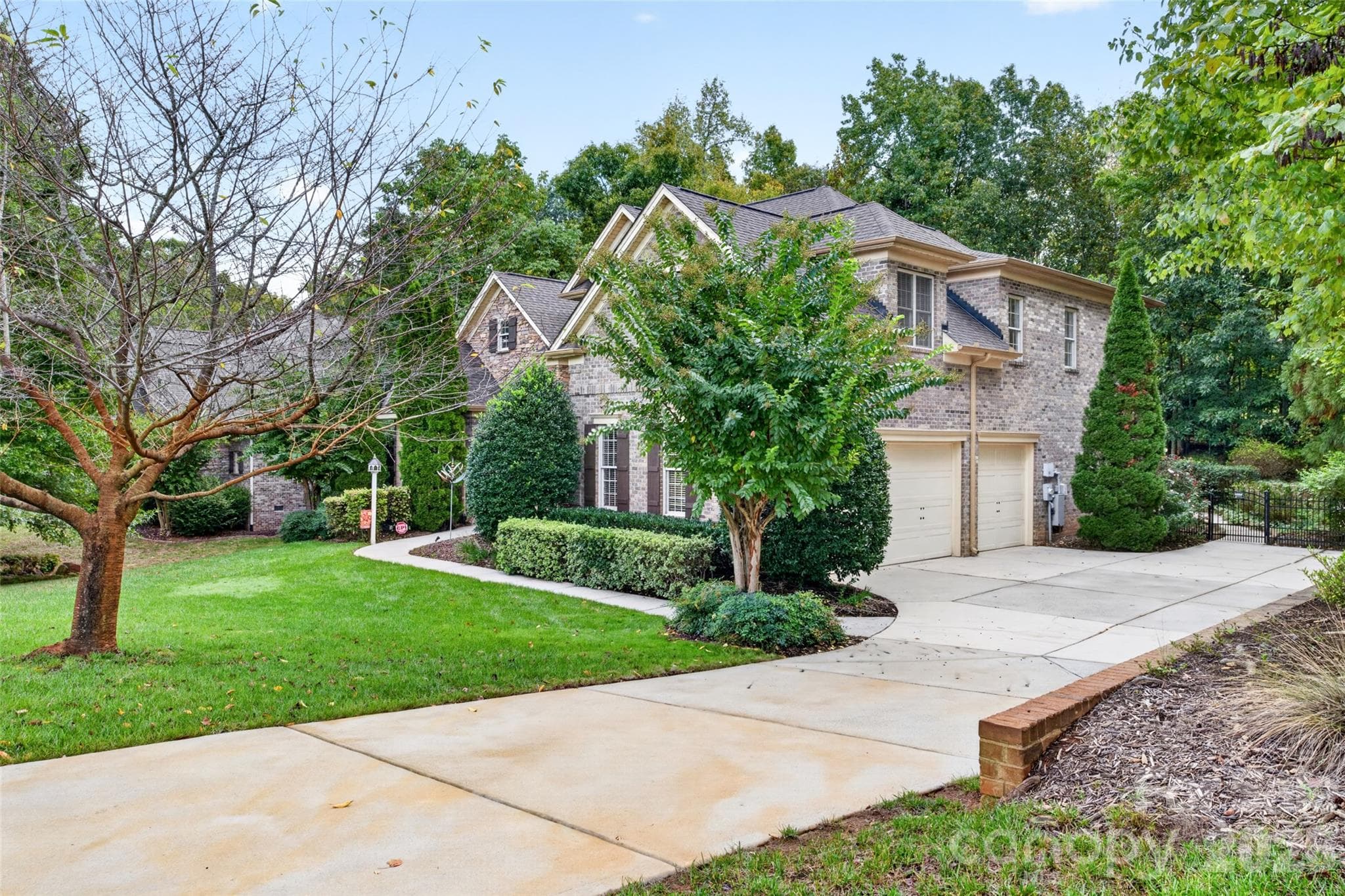 Enjoy the 3 car garage with cabinetry and a Level 2 plug-in EV charging station. - 3941 Grovesner Street, Harrisburg