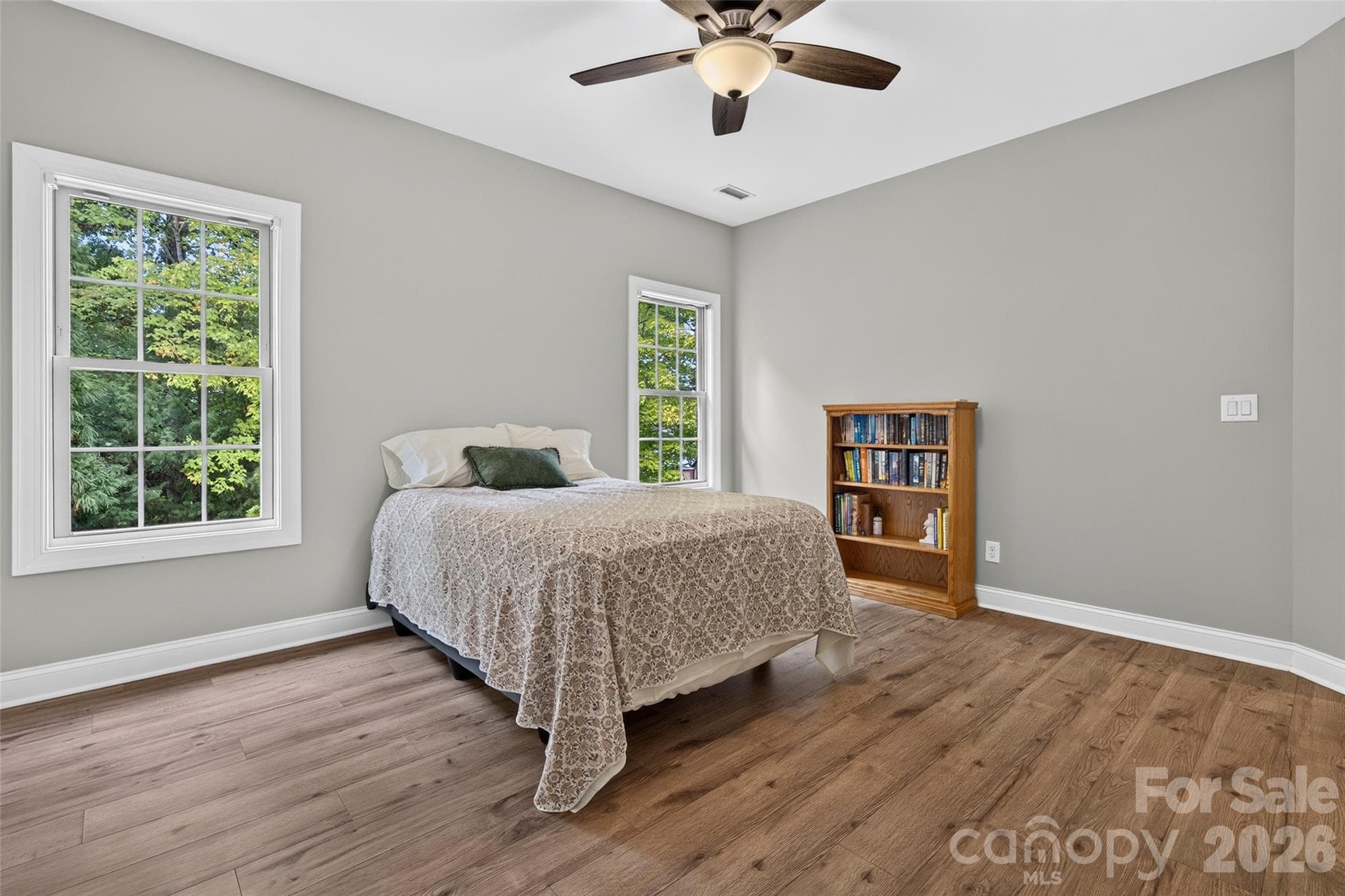 Secondary bedroom with ceiling fan and Jack-n-Jill bathroom. - 3941 Grovesner Street, Harrisburg