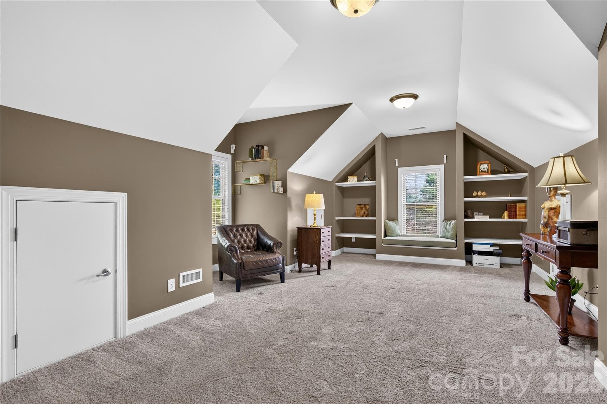 Bonus room with storage, built-in shelving, and reading nook. - 3941 Grovesner Street, Harrisburg