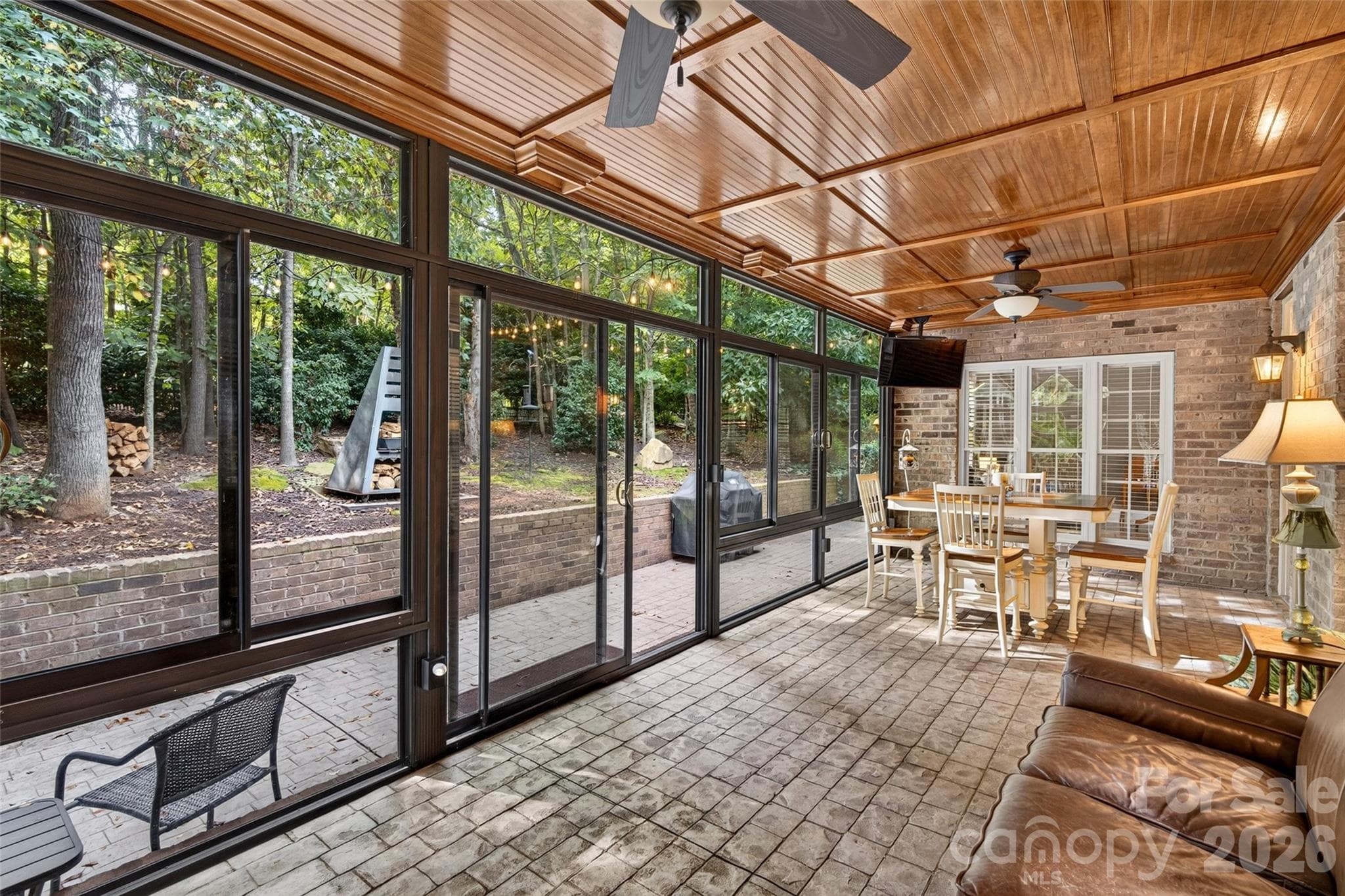 3 season sunroom on back of home with ceiling fans and beadboard ceiling. - 3941 Grovesner Street, Harrisburg