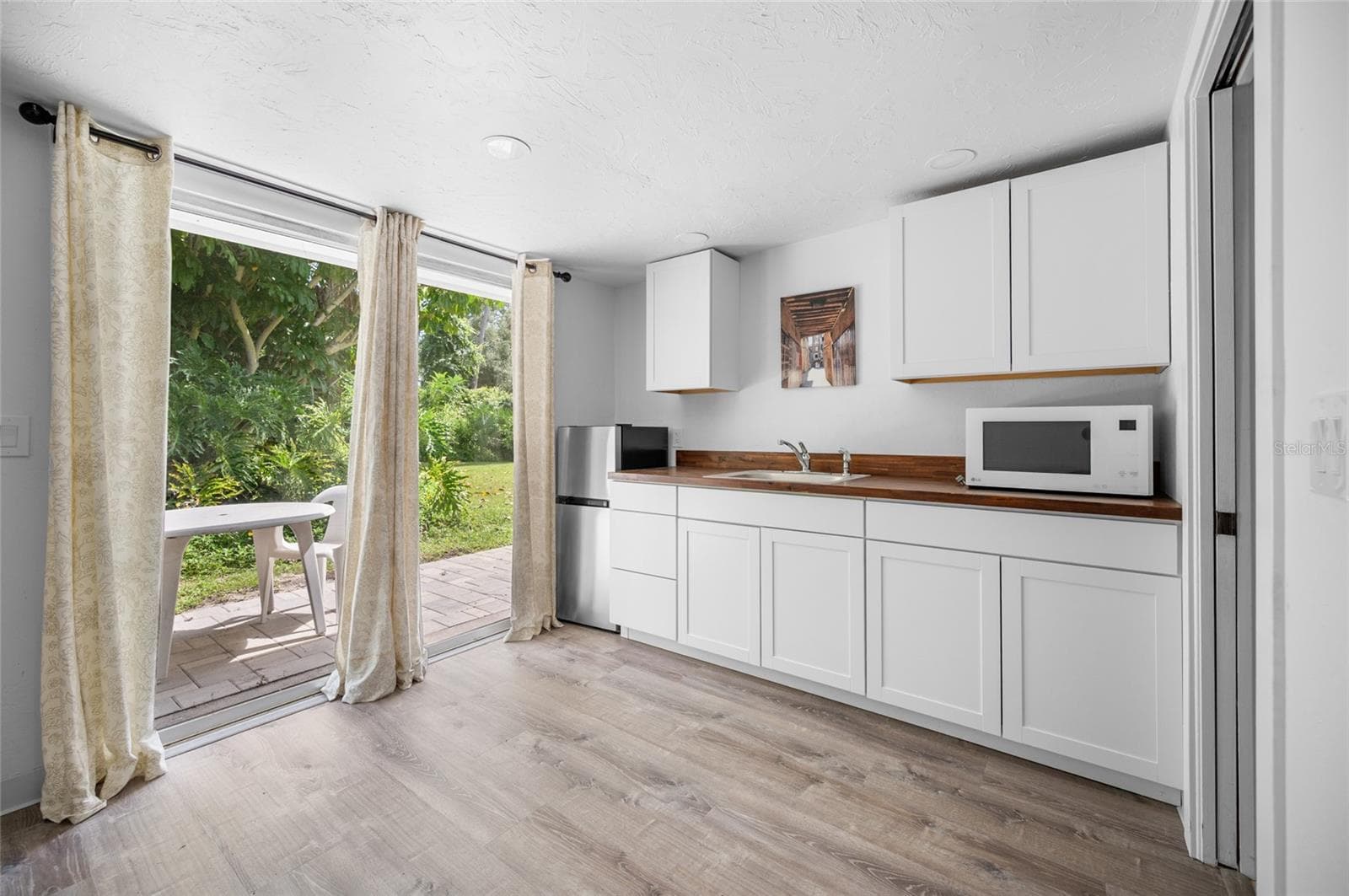 kitchenette with a private porch space - 2111 HEASLEY RD, ENGLEWOOD