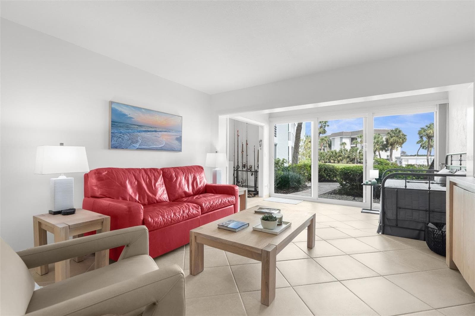 Living Space. Large sliders offer hurricane protection and lots of light - 600 SUTTON PL #101B, LONGBOAT KEY