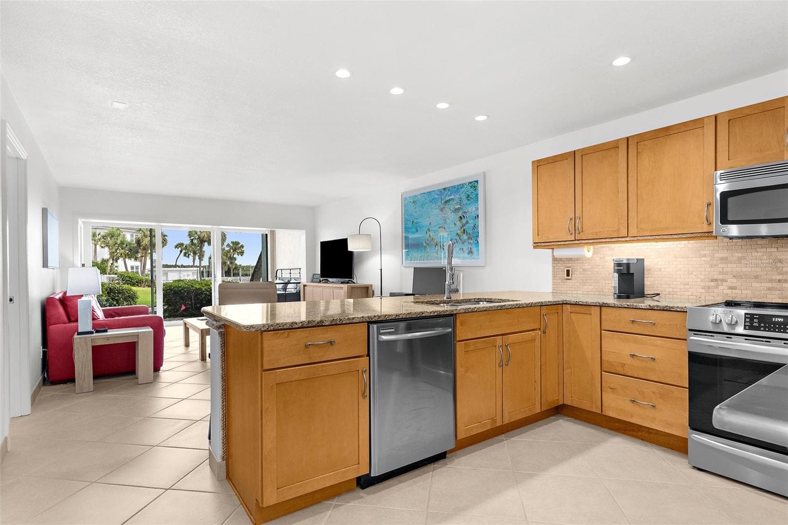 Even from the kitchen you can enjoy the views - 600 SUTTON PL #101B, LONGBOAT KEY