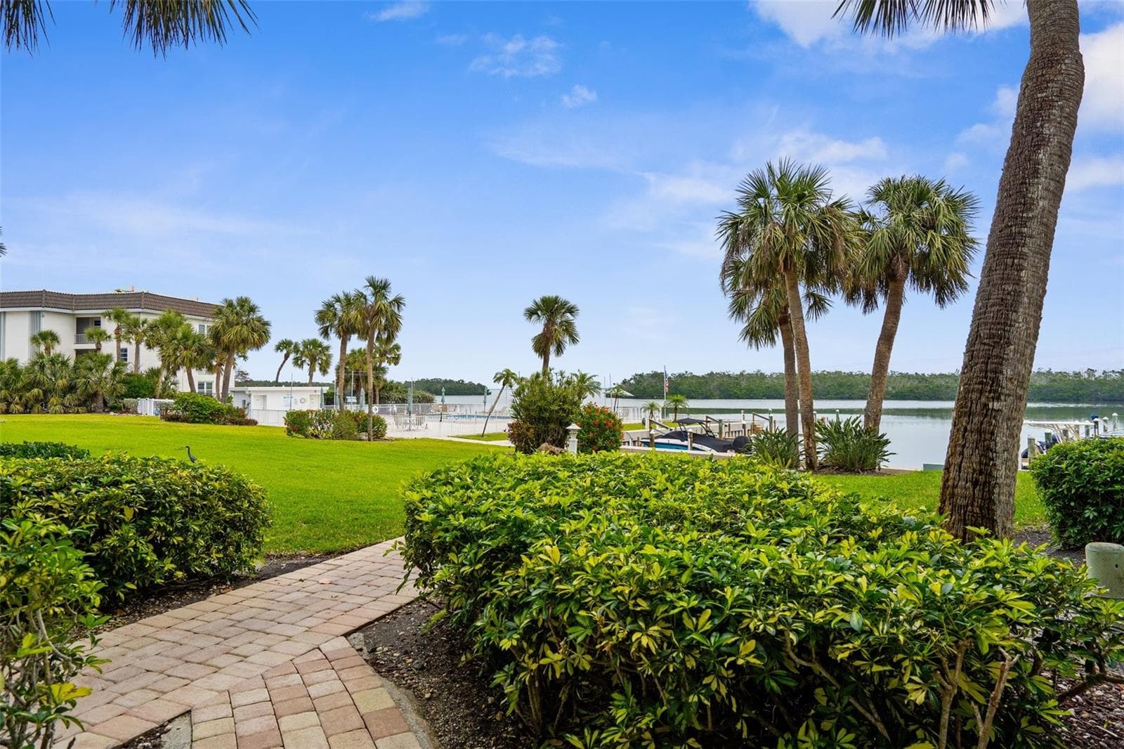 View from Sitting Area in Condo. Pool, Intercoastal, Boats - 600 SUTTON PL #101B, LONGBOAT KEY