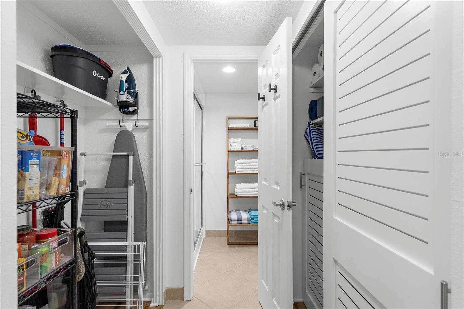 Hallway, Pantry. Close to the kitchen for easy access - 600 SUTTON PL #101B, LONGBOAT KEY