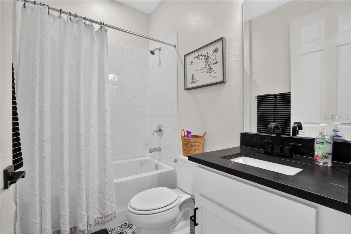 downstairs bathroom - 10971 BLUESTEM CV, PARRISH