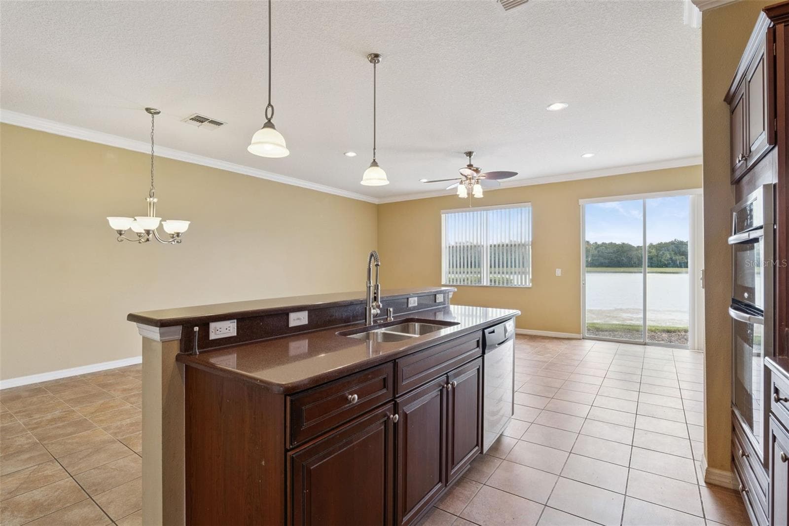 Kitchen with lake View - 3853 GLIDING PL, SANFORD
