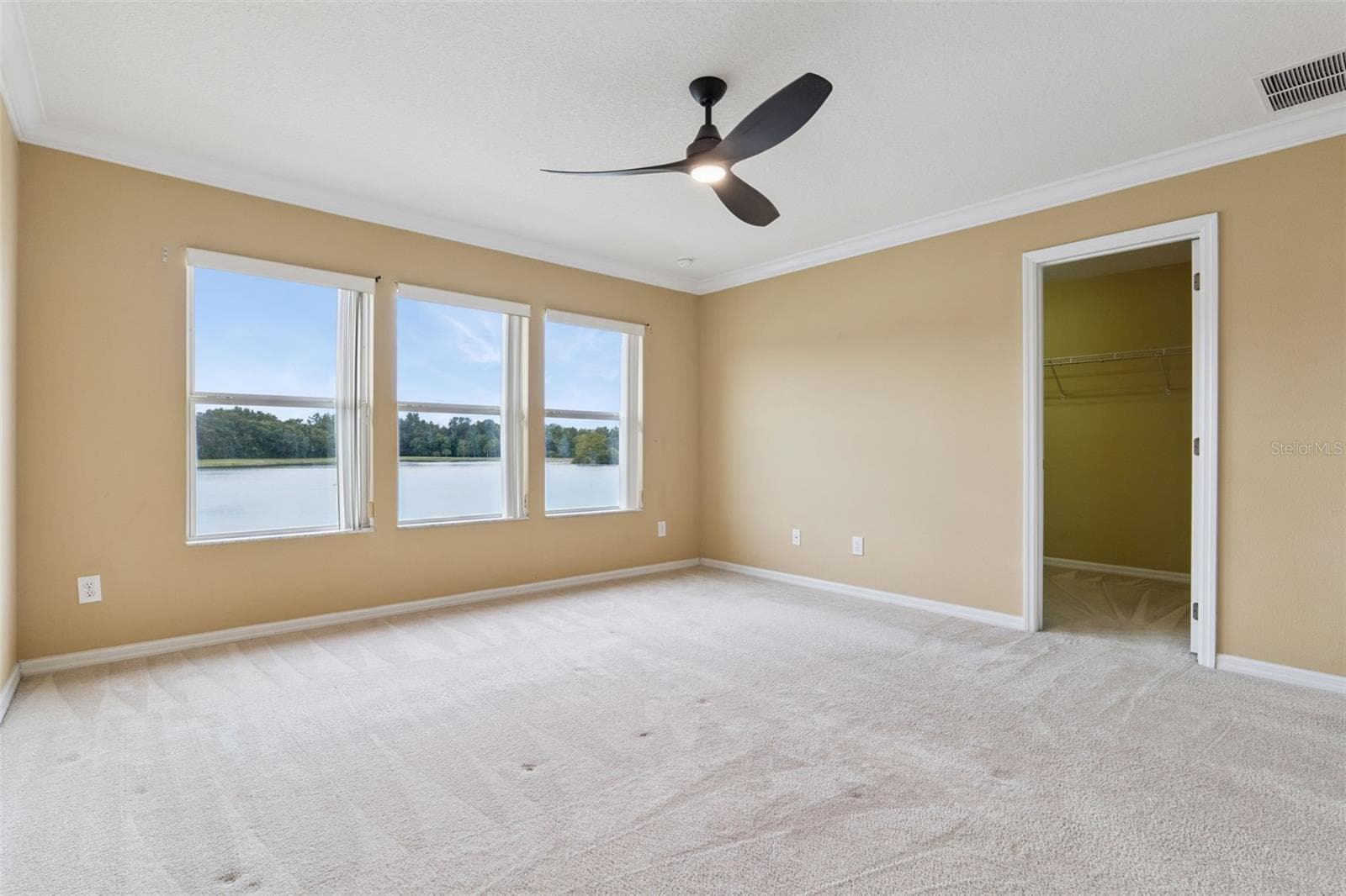 Bedroom 1/ Lake view and walk-in Closet - 3853 GLIDING PL, SANFORD