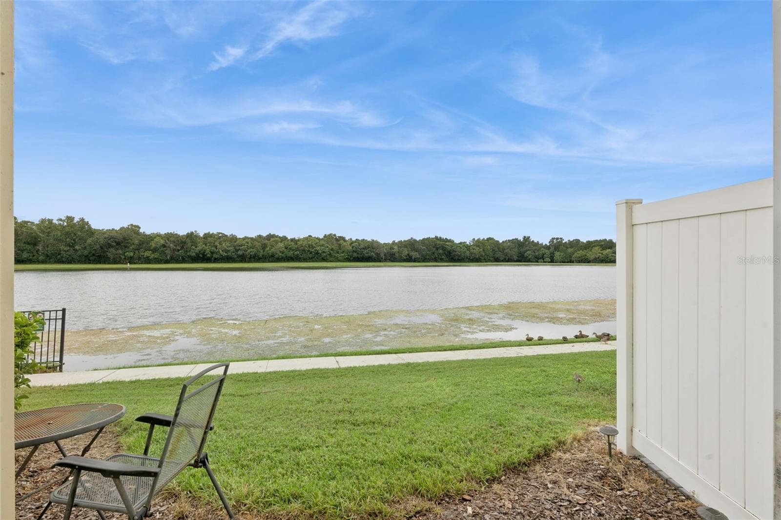 Rear Exterior with Lake View - 3853 GLIDING PL, SANFORD