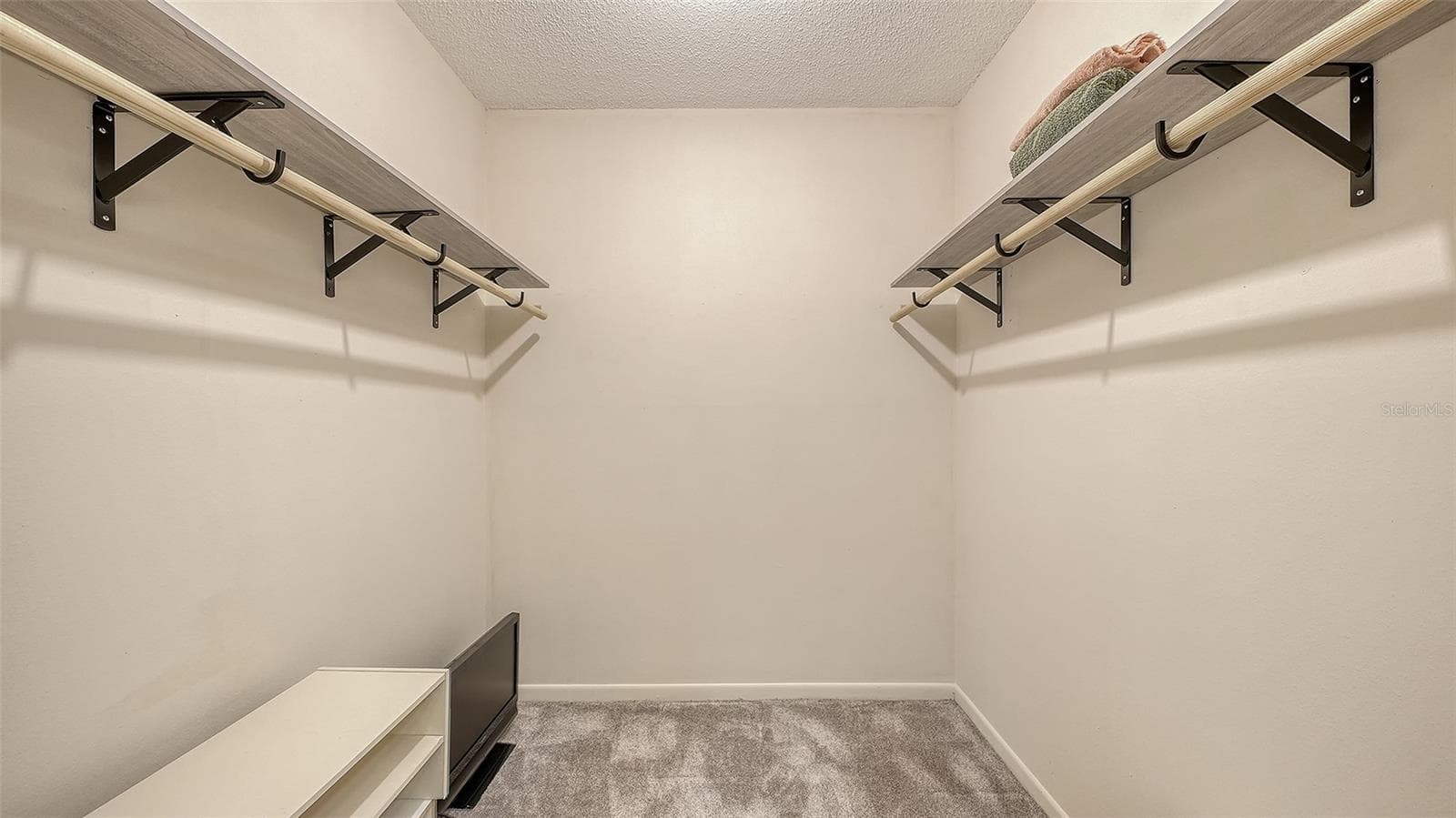 The primary bedroom has a walk-in closet. A rarity in a unit this size. - 4207 BOWLING GREEN CIR, SARASOTA