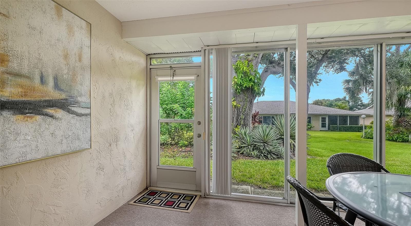 The lanai has its own door to the luscious greenbelt. - 4207 BOWLING GREEN CIR, SARASOTA