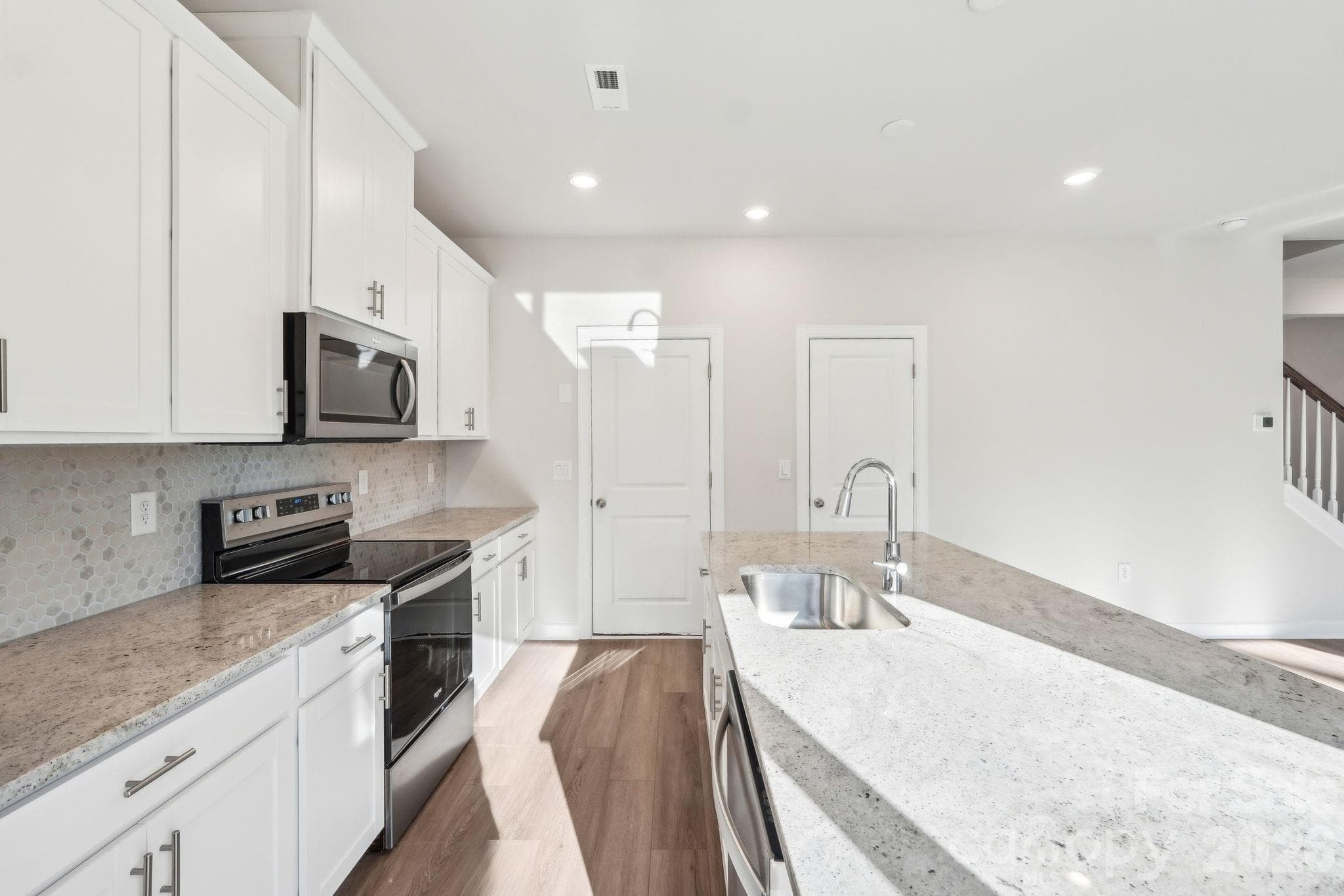 Photo is not of the actual home but is an inspirational photo of builder’s model home and may depict options, furnishings, and/or decorator features that are not included. - 3061 14th Avenue NE, Conover