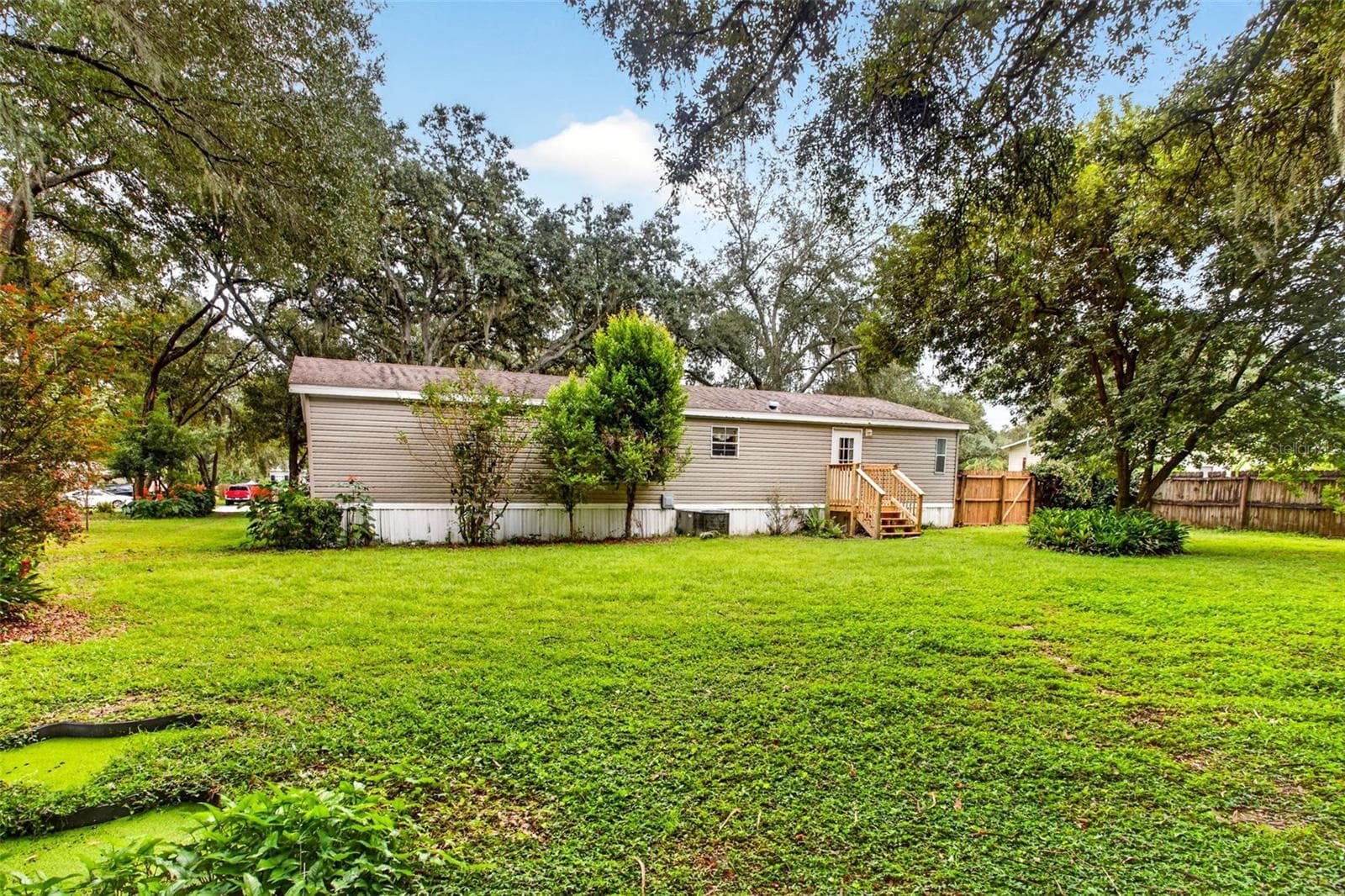 Manufactured Home at 7305 TIMBER CREST LN, ZEPHYRHILLS, photo 4 of 52