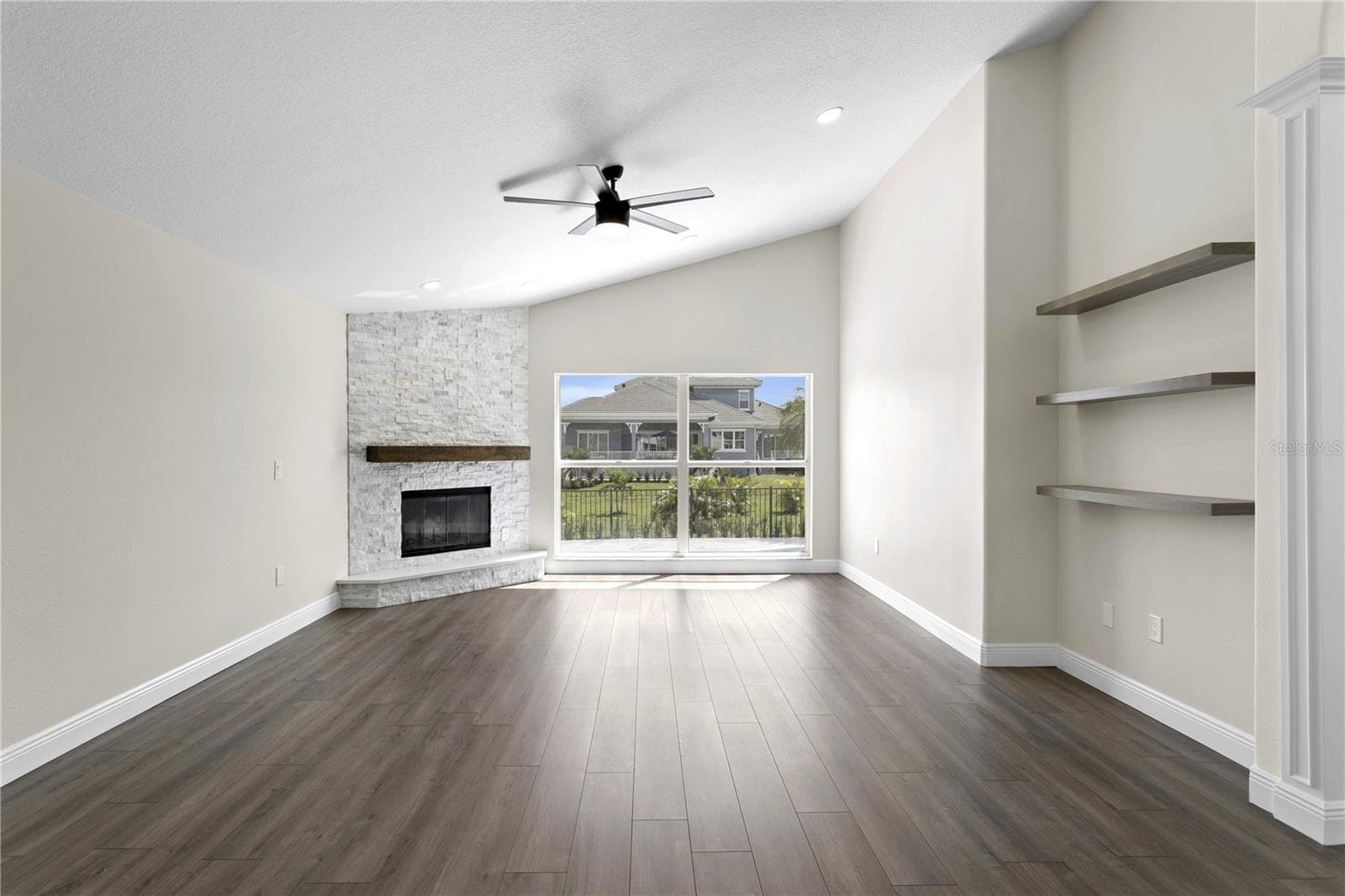 The spacious family room opens to the kitchen and additional living spaces, creating an ideal flow for everyday living and entertaining. - 6402 RUBIA CIR, APOLLO BEACH