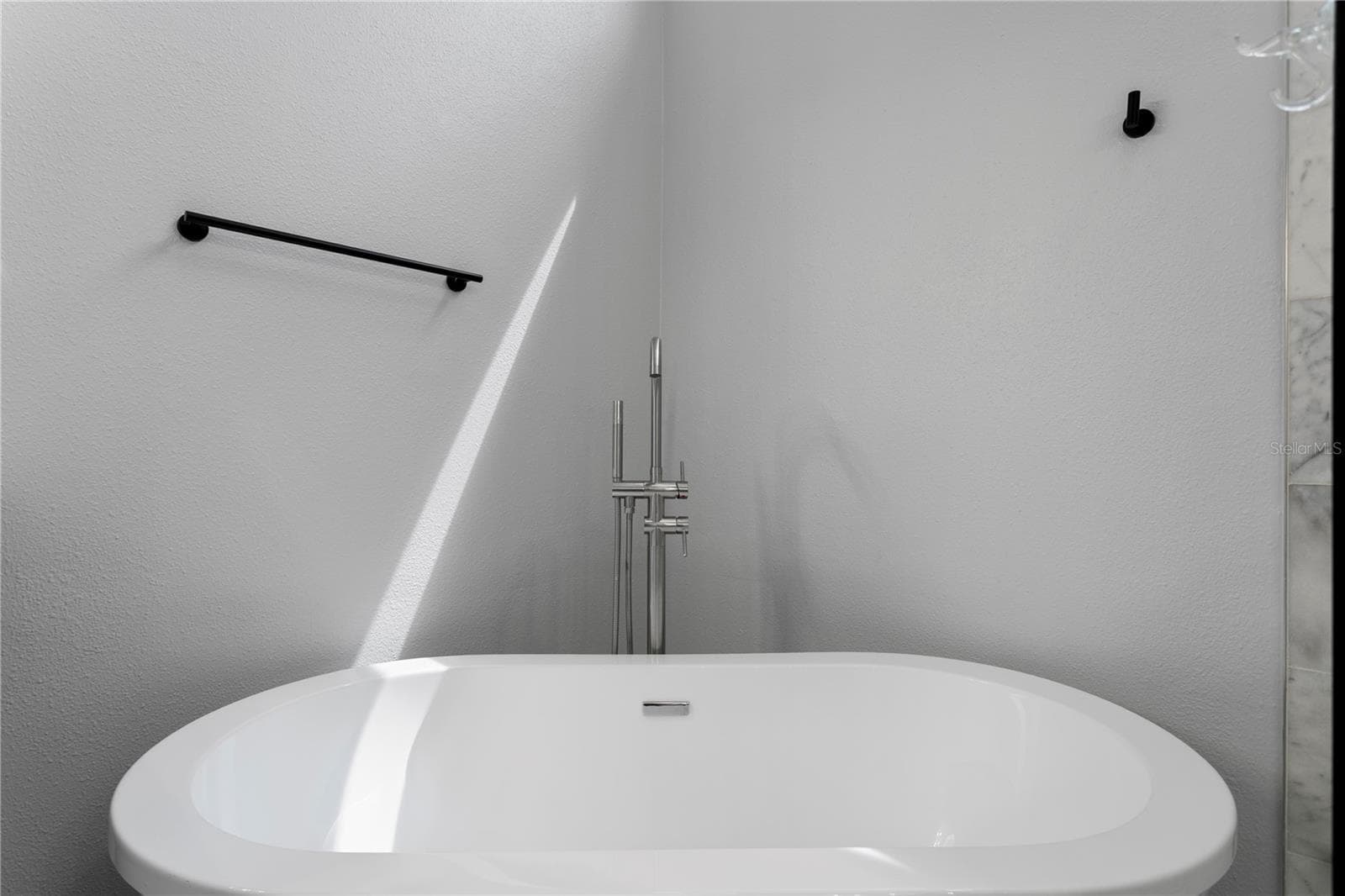 Unwind in the inviting freestanding soaking tub - 6402 RUBIA CIR, APOLLO BEACH