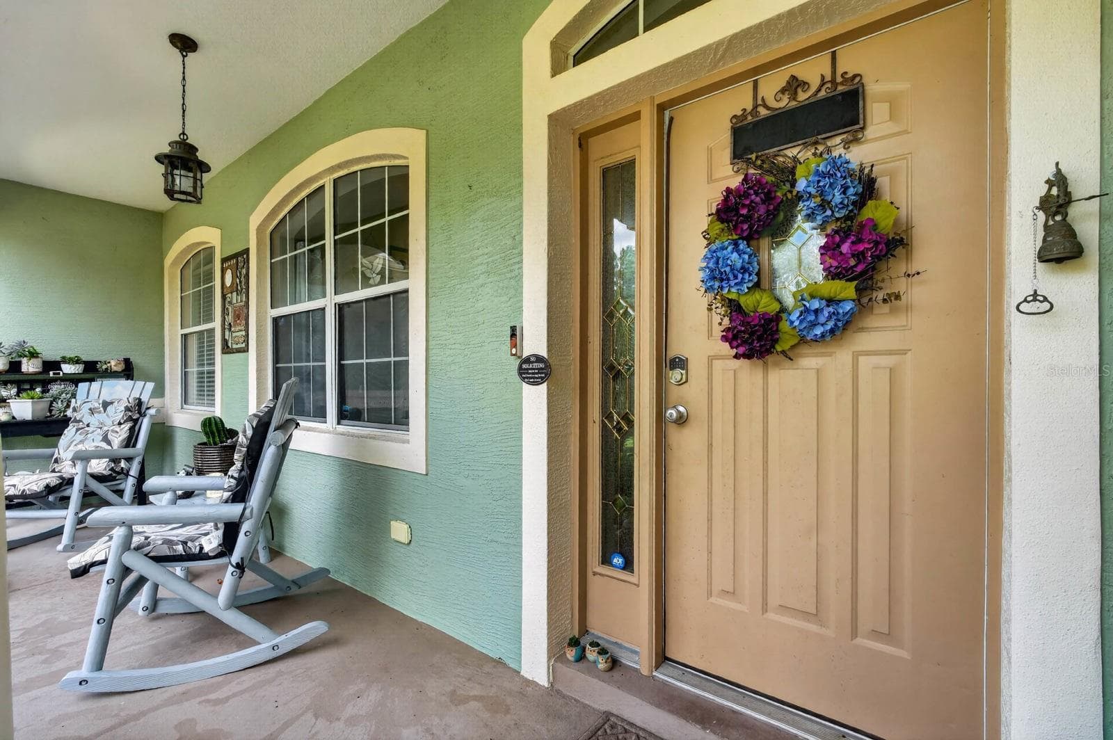 front entrance has nice covered porch landing - 72 KARAS TRL, PALM COAST