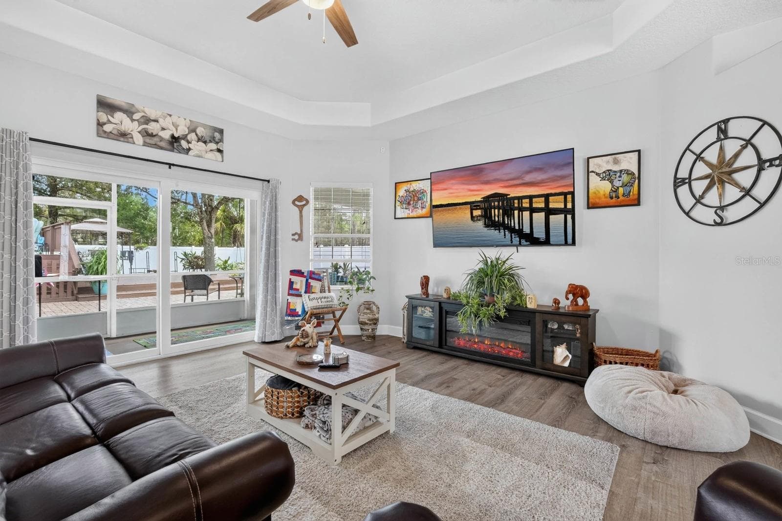 living room with sliders - 72 KARAS TRL, PALM COAST