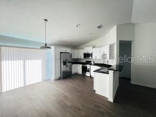 Nice kitchen with dining area. Granite counters, White Shaker cabinets - 3 FISHER WAY PL, OCKLAWAHA