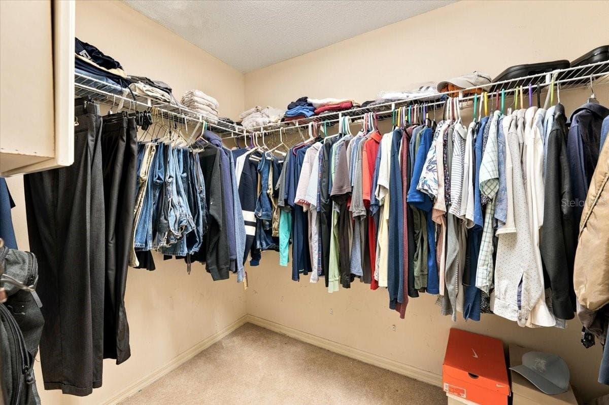 One of two walk in closets in primary bath - 4437 FLINTLOCK LOOP, LAKELAND