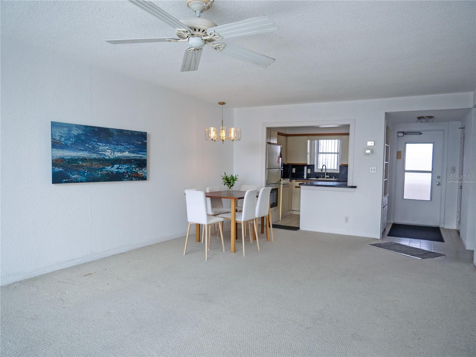 Virtually Staged Dining area - 7000 BEACH PLZ #202, ST PETE BEACH