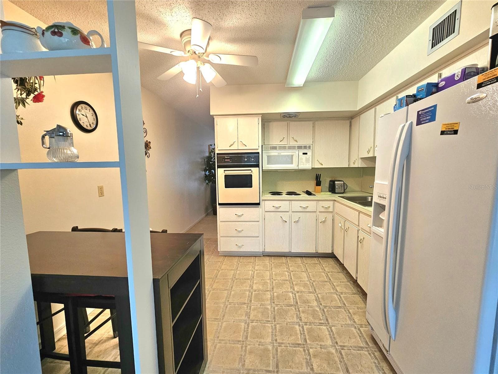 Condominium at 2426 PERSIAN DR #64, CLEARWATER, photo 9 of 72