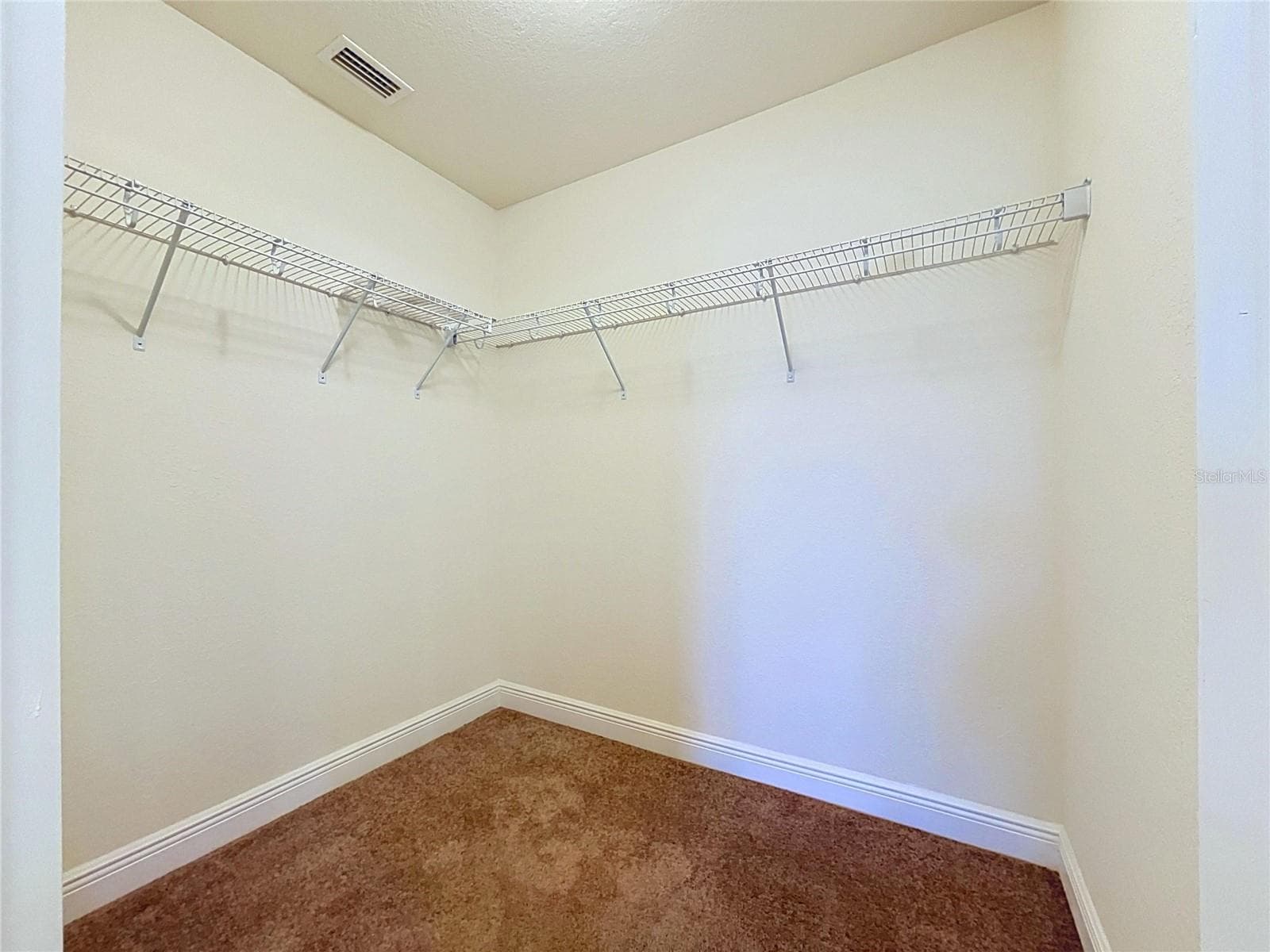 PRIMARY CLOSET - 7029 WIREVINE DR, BROOKSVILLE