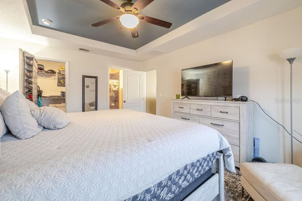 Primary bedroom with walk-in closet and ensuite bathroom - 252 SHERRI LEE LN, DELAND